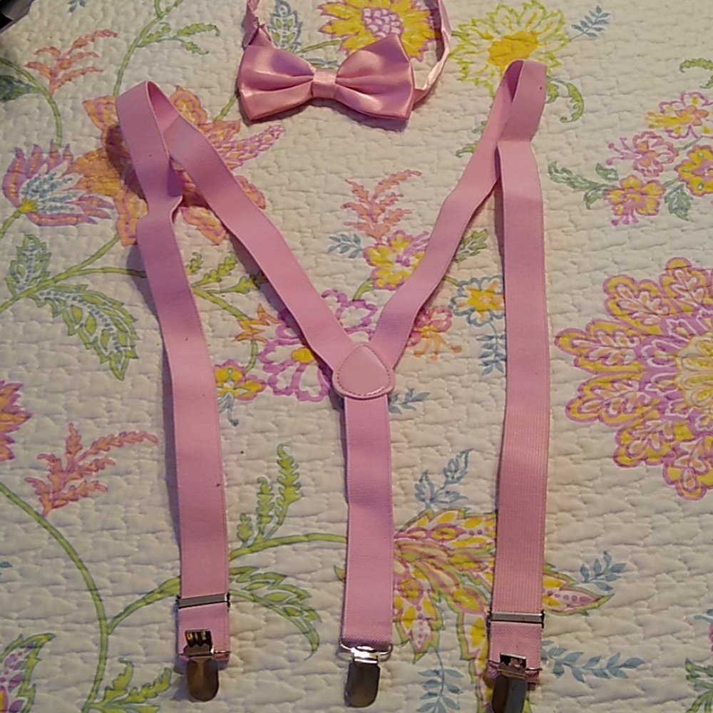 Pink suspenders and bow tie